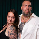 Gold chains and pendant by Wolfe Gemz worn by couple, custom jewelry collection from NYC
