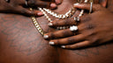 Custom lab diamond rings and gold chains from Wolfe Gemz NYC, handcrafted jewelry collection on dark background